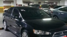 Selling Black Mitsubishi Lancer 2012 in Caloocan