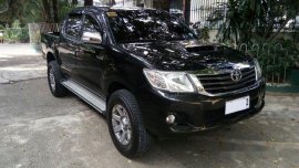 Black Toyota Hilux 2014 for sale in Quezon City 