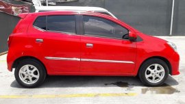 Red Toyota Wigo 2016 for sale in Quezon City 