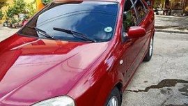 Sell Red 2004 Chevrolet Optra in Manila