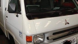 White Mitsubishi L300 2014 for sale in Quezon City