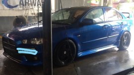 Selling Blue Mitsubishi Lancer 2012 in Manila