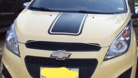 Selling Cream Chevrolet Spark 2014 in Pili