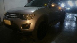 Selling Silver Mitsubishi Strada 2014 in Manila