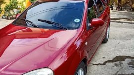 Red Chevrolet Optra 2004 for sale in Manual