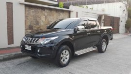 Black Mitsubishi Strada 2015 for sale in Automatic