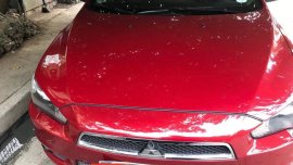 Red Mitsubishi Lancer 2013 for sale in Automatic