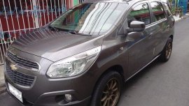 Selling Grey Chevrolet Spin 2015 Automatic Gasoline 