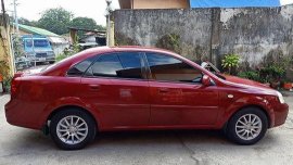 Sell Red 2004 Chevrolet Optra Manual Gasoline 