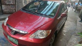 Red Honda City 2005 at 95000 km for sale 