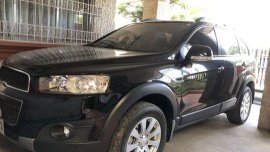Selling Black Chevrolet Captiva 2014 at 24800 km