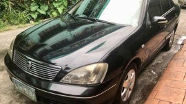 Black Nissan Sentra 2009 for sale in Pasig 