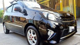 Selling Black Toyota Wigo 2014 in Manila