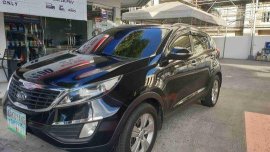 Sell Black 2011 Kia Sportage in Quezon City 