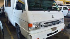 White Mitsubishi L300 2018 for sale in Quezon City