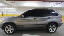 Selling Silver Bmw X5 2006 at 70000 km 