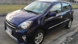 Blue Toyota Wigo 2016 for sale in Cavite 