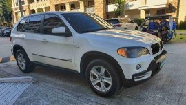 White Bmw X5 2009 at 61000 km for sale 