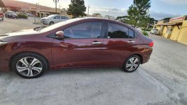 Red Honda City 2015 at 27000 km for sale 