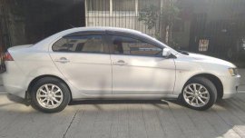 Selling Silver Mitsubishi Lancer Ex 2014 at 26000 km