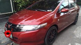 Red Honda City 2009 at 97000 km for sale 