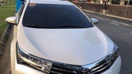 Selling White Toyota Corolla Altis 2015 at 19000 km 