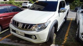 White Mitsubishi Strada 2017 for sale in Silang