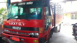 Selling Purple Isuzu Elf 2016 in Dumanjug