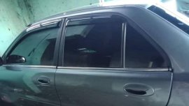 Selling Silver Mitsubishi Lancer 2004 in Manila