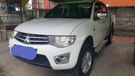 White Mitsubishi Strada 2014 for sale in Manila