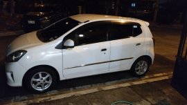 Pearlwhite Toyota Wigo 2014 for sale in Malolos