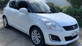 Pearl White Suzuki Swift 2015 for sale in Manila