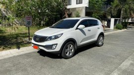 Sell White 2013 Kia Sportage in Taguig
