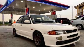 Sell White 1993 Mitsubishi Lancer in Pateros