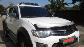 White Mitsubishi Strada 2010 for sale in Manila