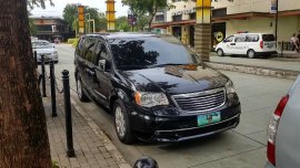 Selling Black Chrysler Town And Country 2012 in Bonifacio