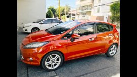 Orange Ford Fiesta 2013 Hatchback for sale in Quezon City