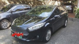 Black Ford Fiesta 2014 at 64000 km for sale 