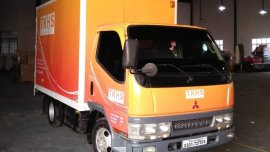 Sell Orange 2006 Mitsubishi Fuso in San Vicente