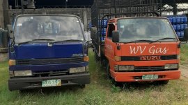 Orange Isuzu Elf 1998 for sale in Manual