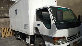 Sell White 2012 Isuzu Elf in Manila