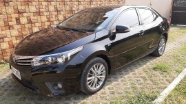 Selling Black Toyota Corolla altis 2014 in Quezon City
