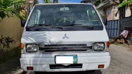 2010 MITSUBISHI L300 FB DELUXE