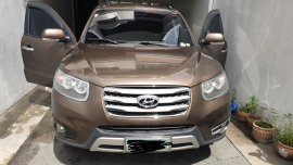 Brown Hyundai Santa Fe 2012 for sale in Quezon City 