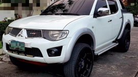 White Mitsubishi Strada 2010 for sale in Taguig