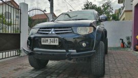 Sell Black 2012 Mitsubishi Strada in Bamban