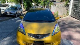 Yellow Honda Jazz 2010 for sale in Manila