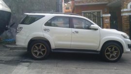 Pearl White Toyota Fortuner 2013 for sale in Quezon City