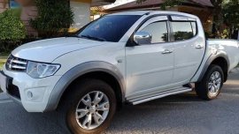 White Mitsubishi Strada 2011 for sale in Manual