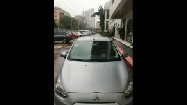 Silver Mitsubishi Mirage 2014 Hatchback for sale in Makati City 